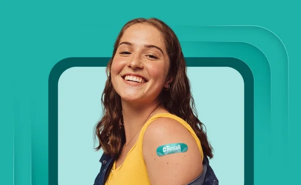 A Rexall pharmacist preparing a vaccination